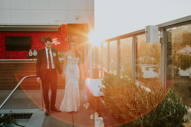 bride and groom on hollywood rooftop