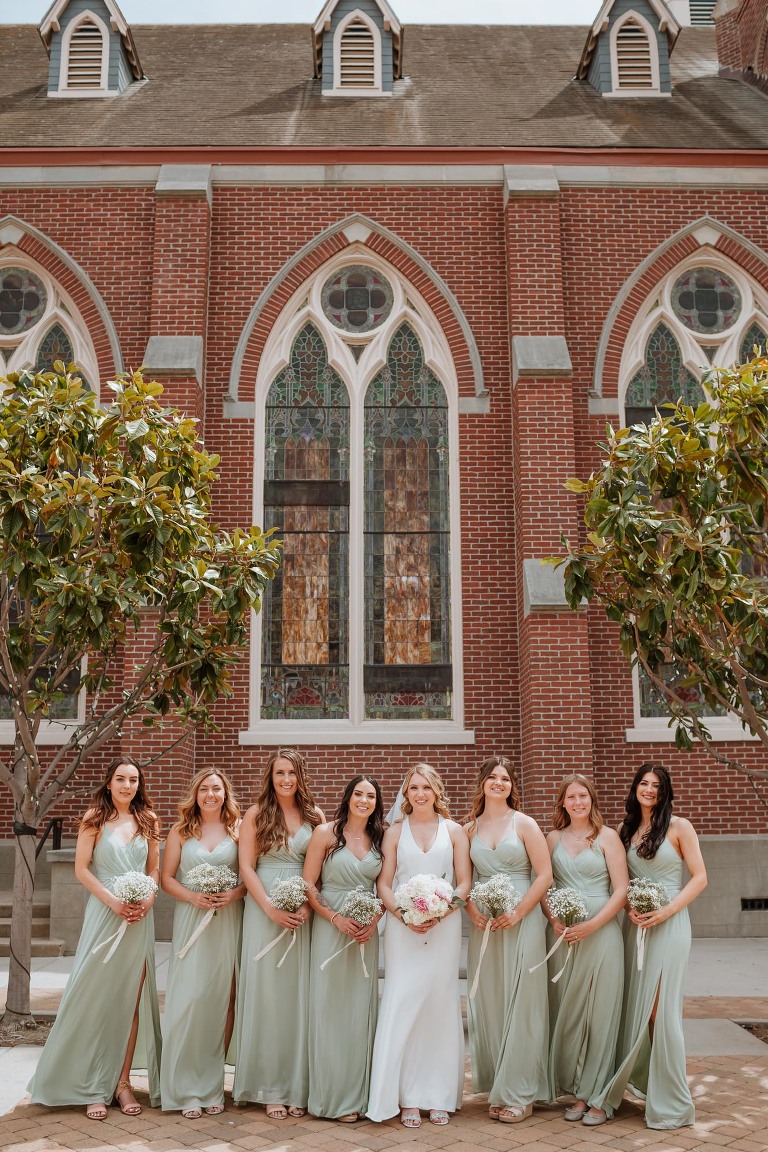 bride and bridesmaids at st. johns lutheran church in orange 