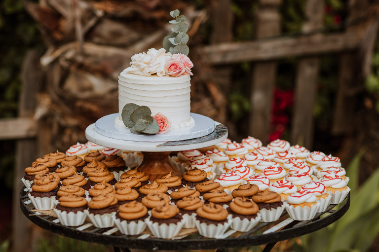 homemade wedding cake and cupcakes