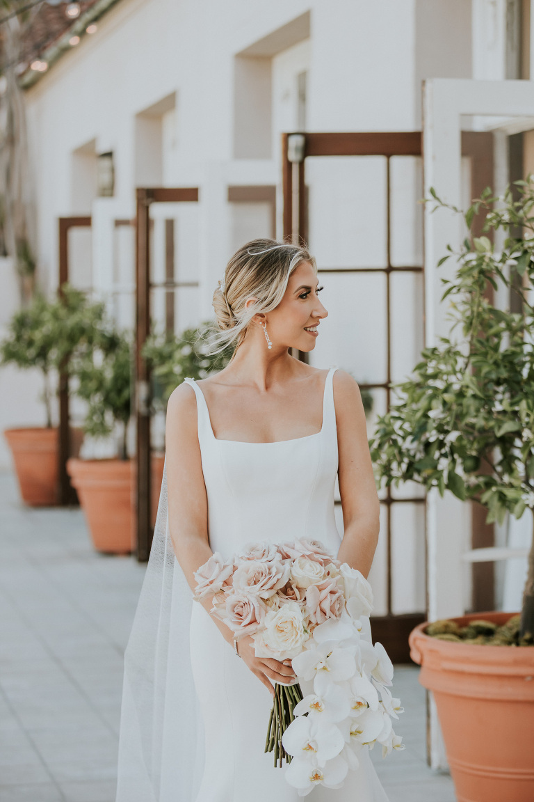 bride in courtyard at the ebell