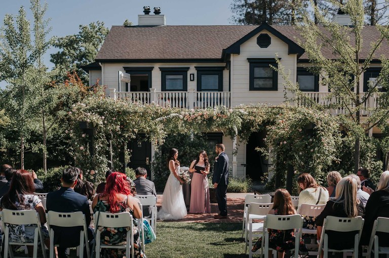 wedding ceremony at MacArthur Place Hotel in rose garden in Sonoma California