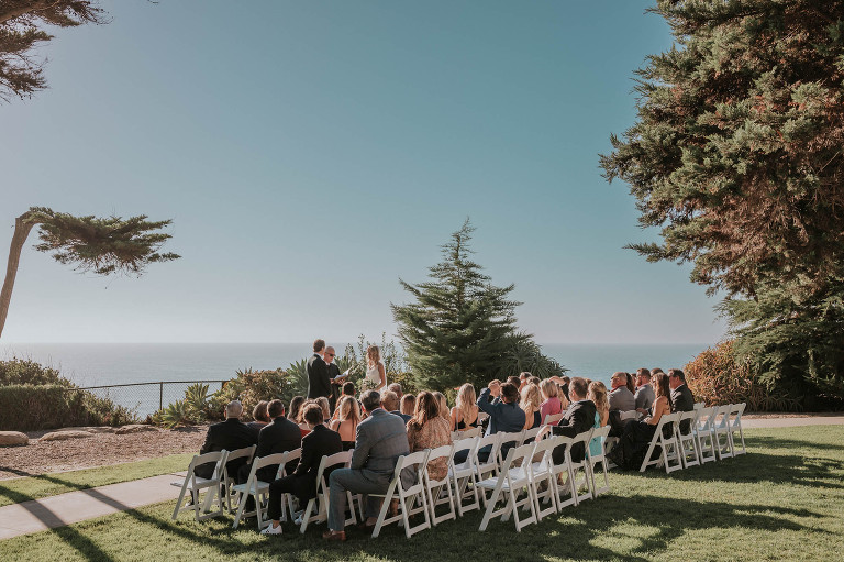 wedding ceremony on the lawn overlooking the ocean at martin johnson house in la jolla