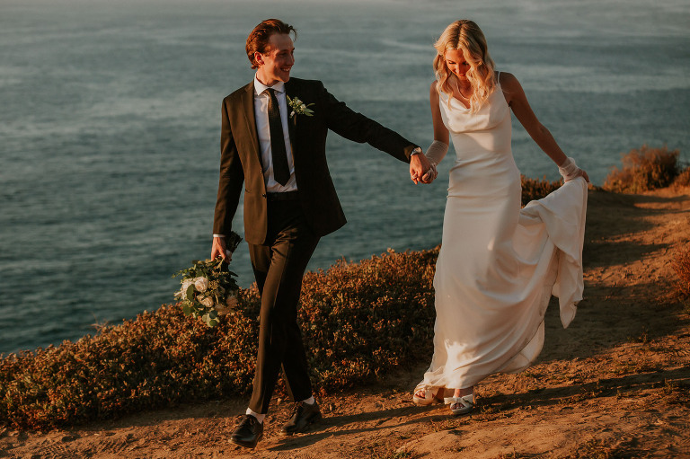 bride and groom was along the bluff overlooking the ocean at Martin johnson house wedding