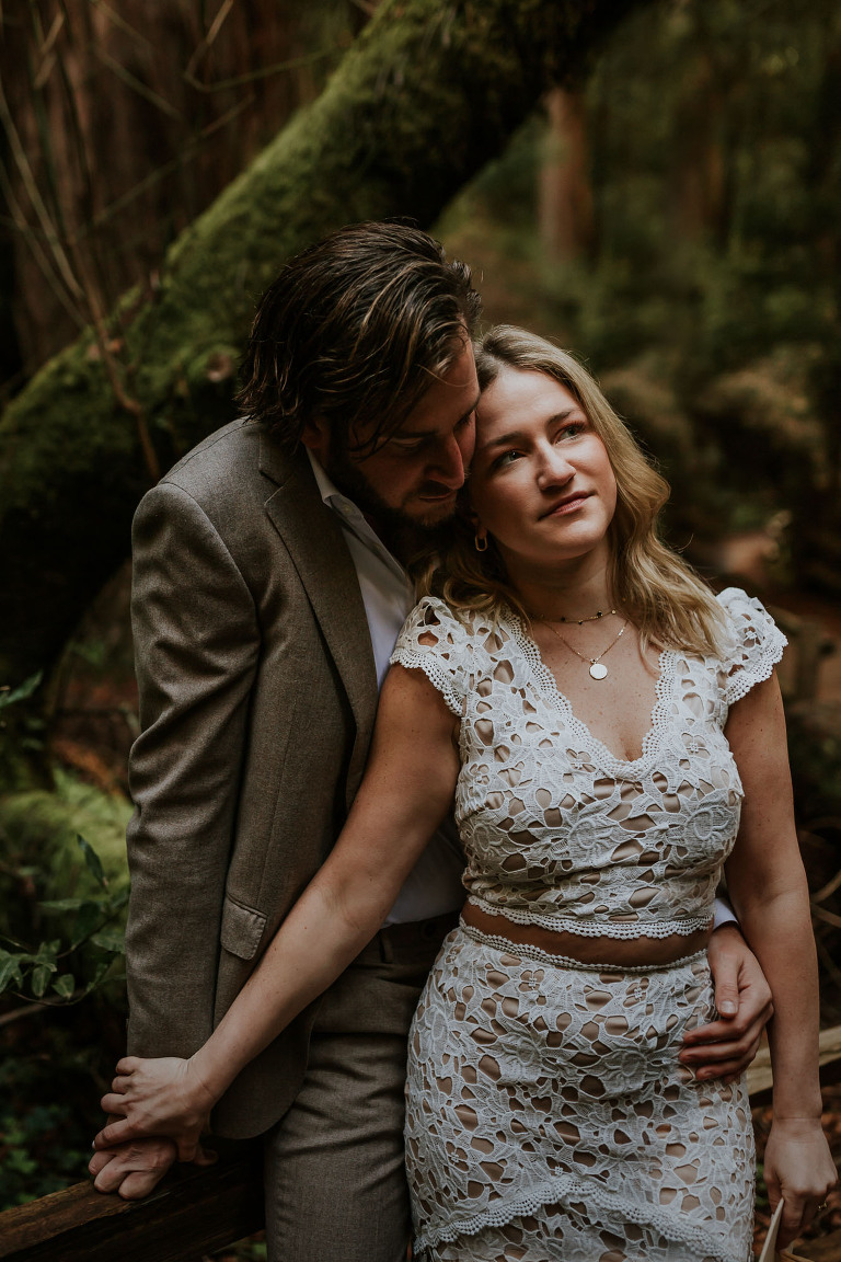 a couple in the forest muir woods engagement session